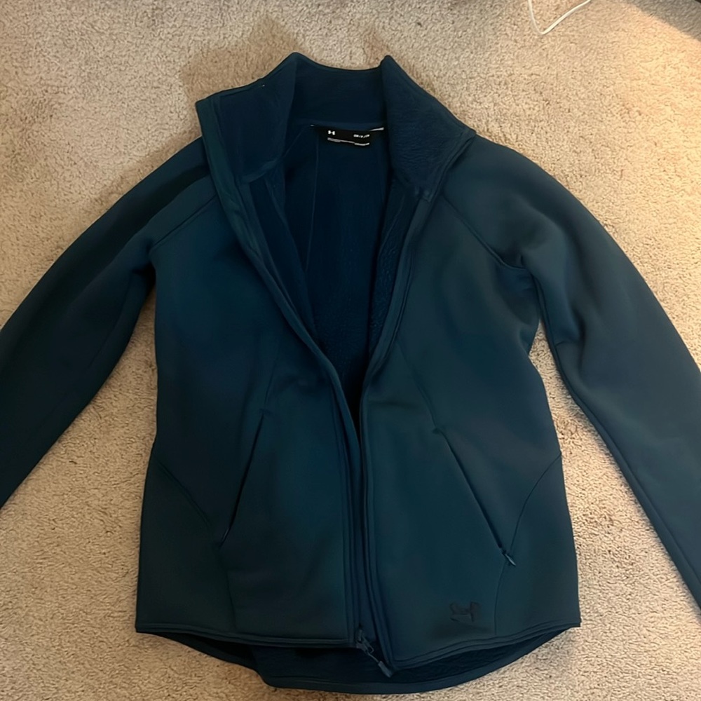 Under Armour navy blue/ hint of teal jacket. Only worn a few times.